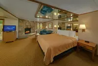 King-bed-and-fireplace-inside-Jacuzzi-room