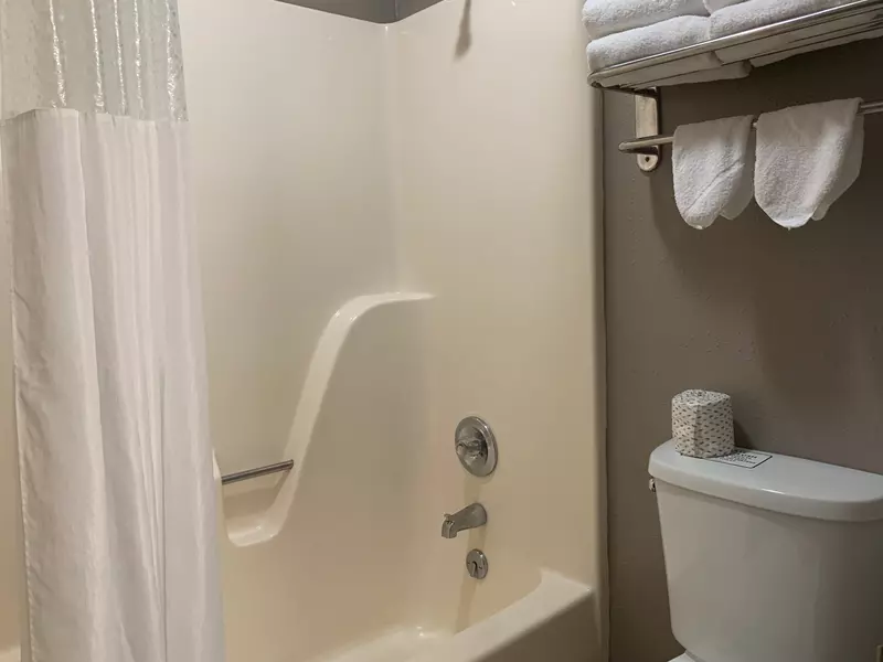 Bathroom of double queen courtside room with balcony